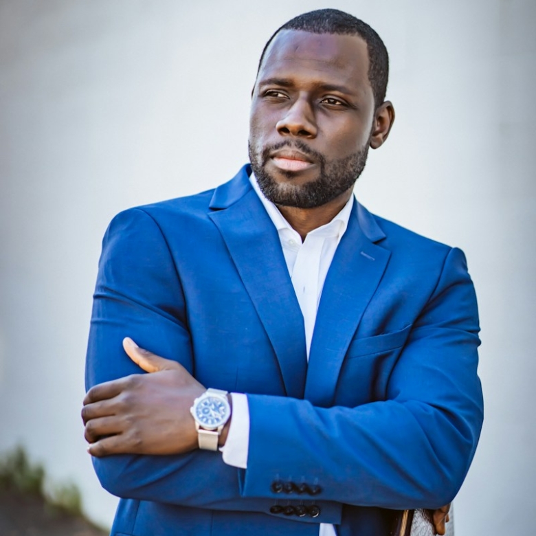 man in blue suit jacket